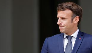 Macron napovedal možnost referenduma o priseljevanju